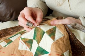 woman quilting