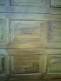 Side view of six panels of metal woodgrained door with walnut look