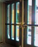 Masking the new interior metal doors of the First Presbyterian Church.