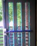 This pictures shows the spot putty used to cover the metal screws around the window casings on the new metal doors