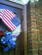 A picture showing the original color of the casing around the north church door entrance.
