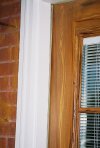 This is a closeup view of the grain on the left side of the door