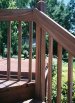 Close up stained and woodgrained hand railing
