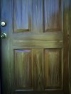 Middle section of  single woodgrained metal entrance door