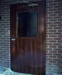 Woodgrained metal utility door at First Presbyterian Church in Logan Utah