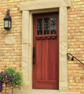 Red mahogany woodgrained door front view.
