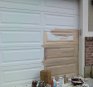 Undercoating beginning panes of garage door