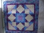 Lyra by Calico Carriage Quiilt Designs in Stonehenge by Northcott