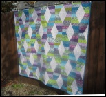 Hugs and Kisses Quilt in Kingdom Fabric by Jessica Levitt