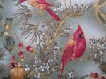Cardinals on pine boughs