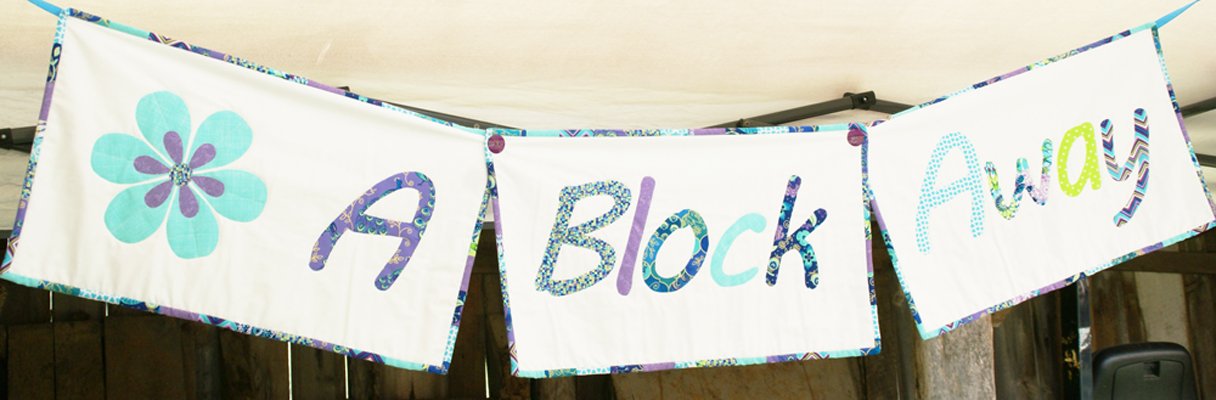 Quilted A Block Away Banner
